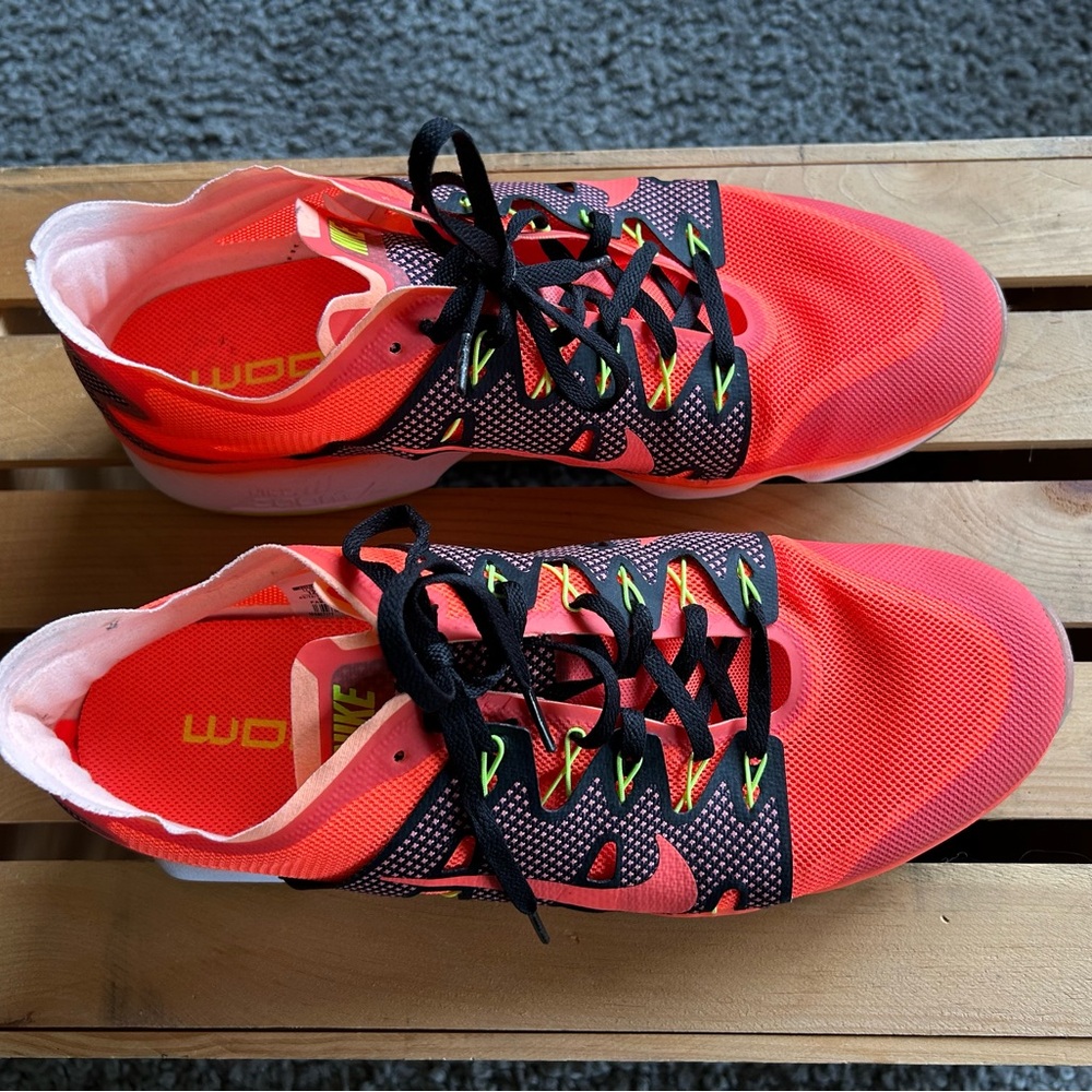 Neon orange Nike Zoom sneakers